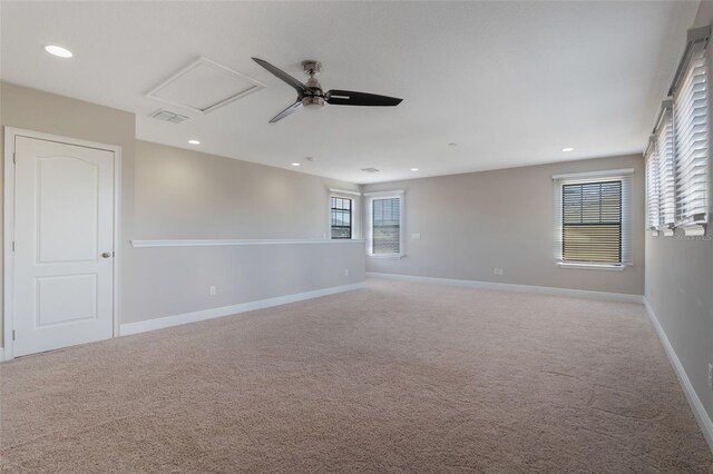 15443 Sugarcup Ct, Orlando, FL 32828 - unfurnished room with light colored carpet, baseboards, recessed lighting, and ceiling fan
