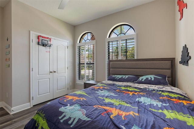 15443 Sugarcup Ct, Orlando, FL 32828 - bedroom featuring wood finished floors, baseboards, a closet, and ceiling fan