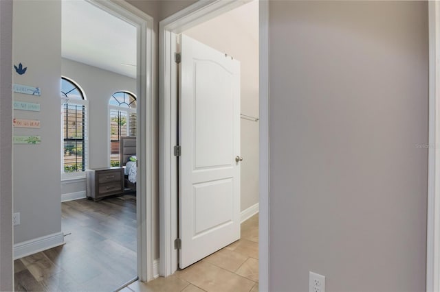 15443 Sugarcup Ct, Orlando, FL 32828 - hallway featuring baseboards