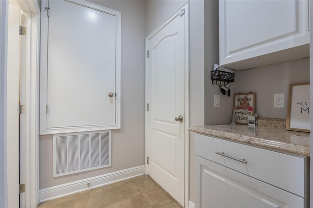 15443 Sugarcup Ct, Orlando, FL 32828 - interior space featuring baseboards and light tile patterned flooring