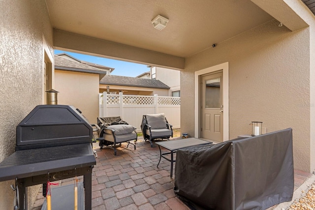 view of patio with fence
