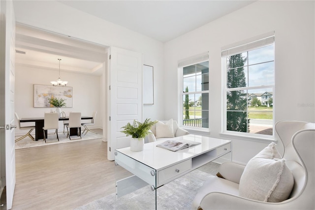 10139 Austrina Oak Loop, Winter Garden, FL 34787 - office featuring a chandelier, visible vents, and light wood-type flooring