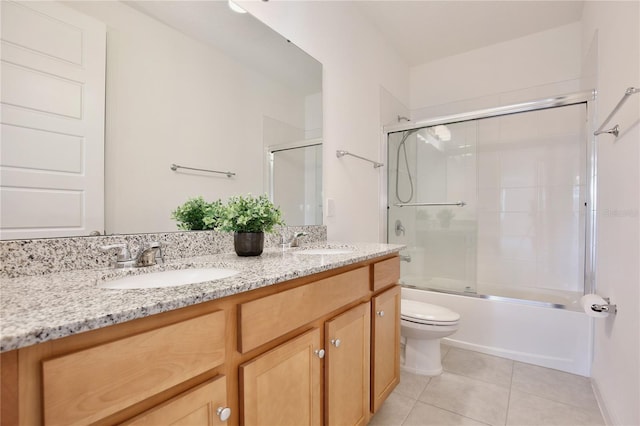 10139 Austrina Oak Loop, Winter Garden, FL 34787 - full bathroom with a sink, tile patterned flooring, toilet, and double vanity