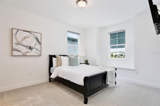 10139 Austrina Oak Loop, Winter Garden, FL 34787 - carpeted bedroom featuring baseboards and multiple windows