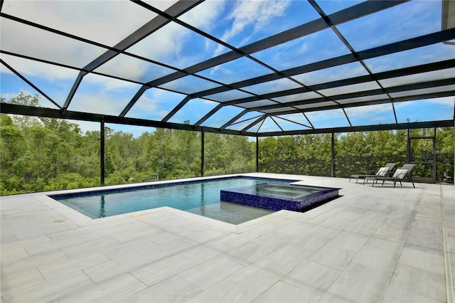 10139 Austrina Oak Loop, Winter Garden, FL 34787 - view of pool with glass enclosure, a pool with connected hot tub, and a patio area