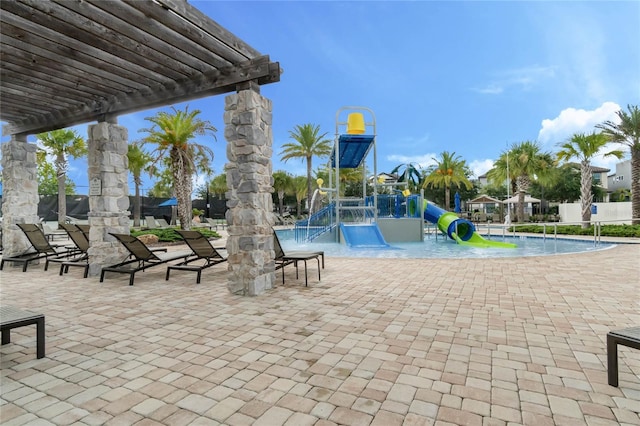 10139 Austrina Oak Loop, Winter Garden, FL 34787 - view of swimming pool with a pergola, playground community, a patio, and a water play area