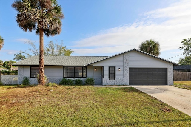 4510 Bonanza St, Cocoa, FL 32927 - ranch-style home with fence, a front yard, a shingled roof, an attached garage, and driveway