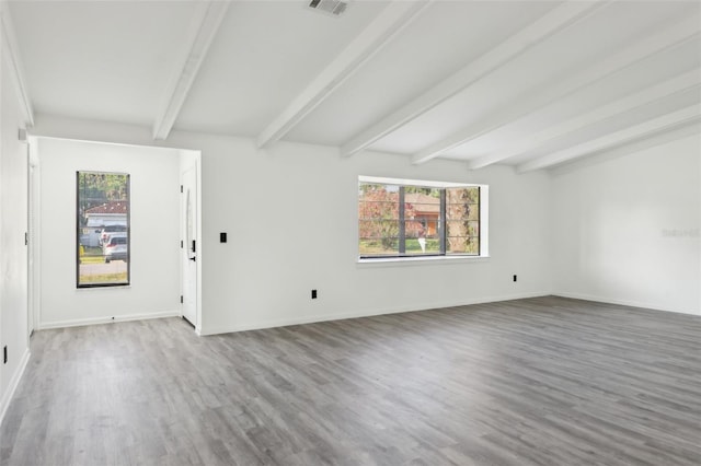 4510 Bonanza St, Cocoa, FL 32927 - unfurnished room featuring baseboards, beamed ceiling, and wood finished floors
