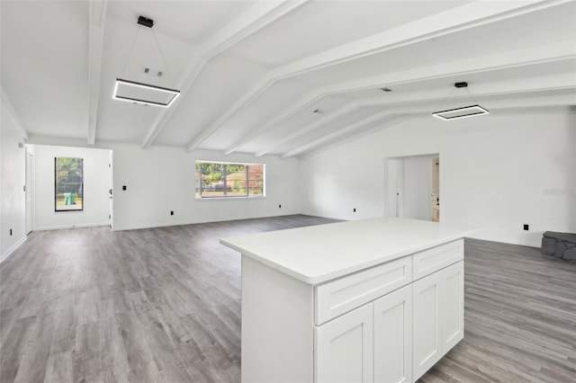4510 Bonanza St, Cocoa, FL 32927 - interior space featuring vaulted ceiling with beams, light wood-style floors, and visible vents