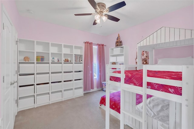 bedroom with ceiling fan and carpet