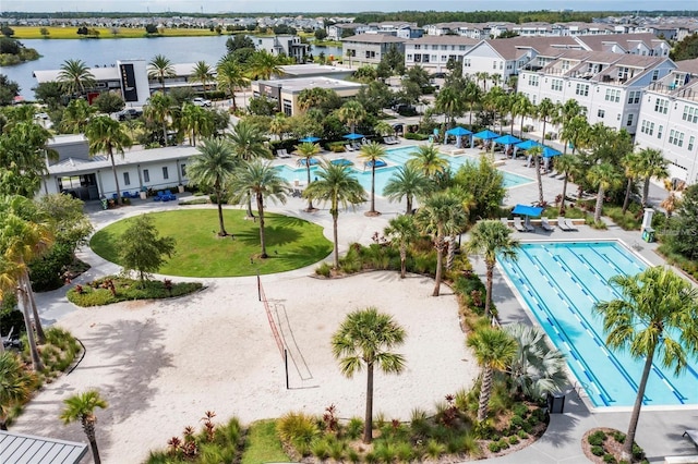 birds eye view of property featuring a water view