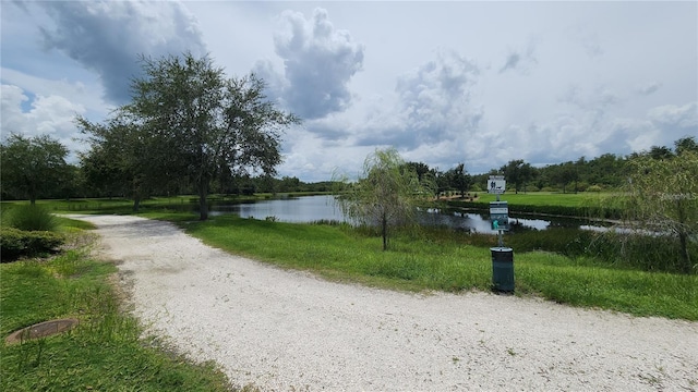 view of home's community with a water view
