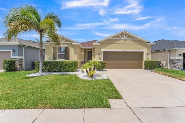 2815 Shelburne Way, Saint Cloud, FL 34772 - view of front of property featuring a garage, a front yard, and stucco siding