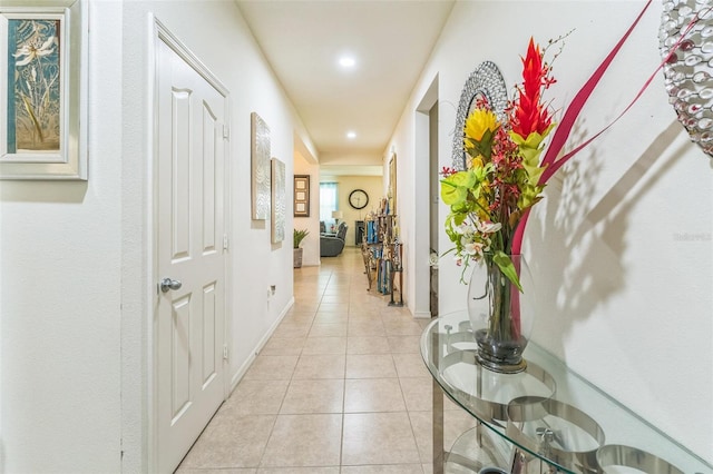 2815 Shelburne Way, Saint Cloud, FL 34772 - hallway with recessed lighting, baseboards, and light tile patterned floors