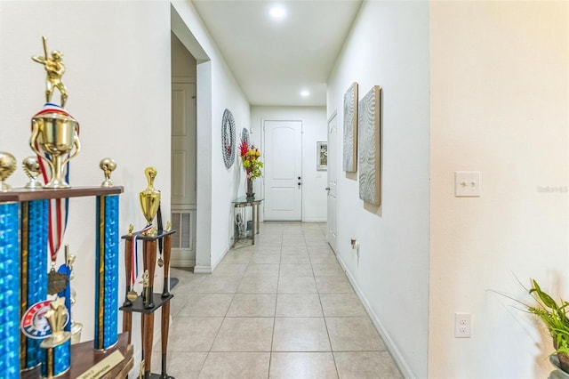 2815 Shelburne Way, Saint Cloud, FL 34772 - corridor with recessed lighting, baseboards, light tile patterned floors, and visible vents
