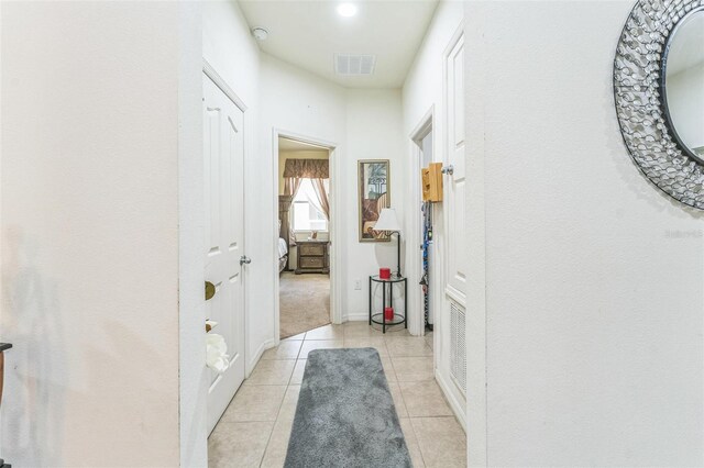 2815 Shelburne Way, Saint Cloud, FL 34772 - hall featuring baseboards, visible vents, and light tile patterned floors