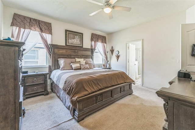 2815 Shelburne Way, Saint Cloud, FL 34772 - bedroom featuring ceiling fan, light colored carpet, and ensuite bathroom