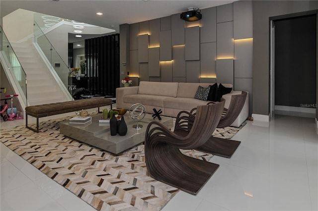 community lobby with stairway and recessed lighting
