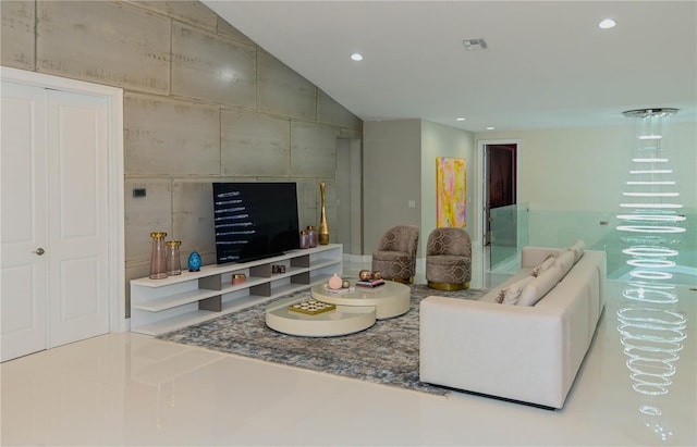 tiled living room featuring recessed lighting and lofted ceiling