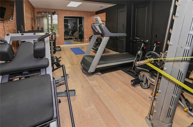 exercise area with wood finished floors
