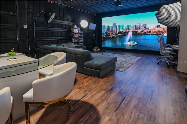 home theater room with wood finished floors