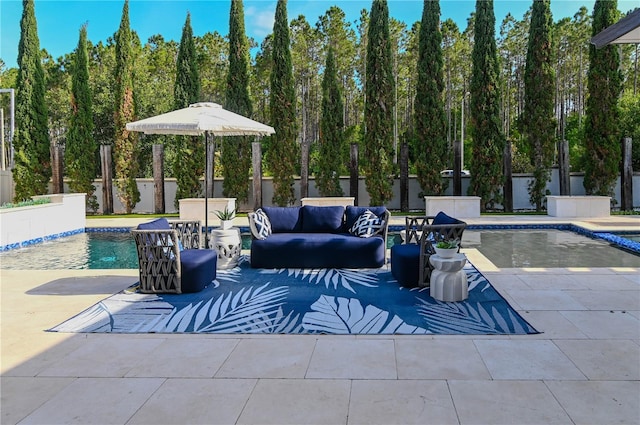 view of pool with a patio area, outdoor lounge area, and fence