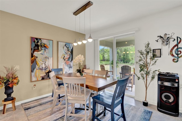 dining room with baseboards