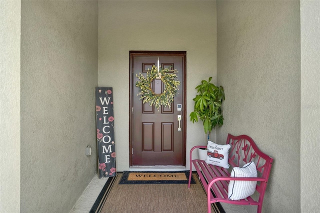 1880 Perch Hammock Loop, Groveland, FL 34736 - property entrance featuring stucco siding