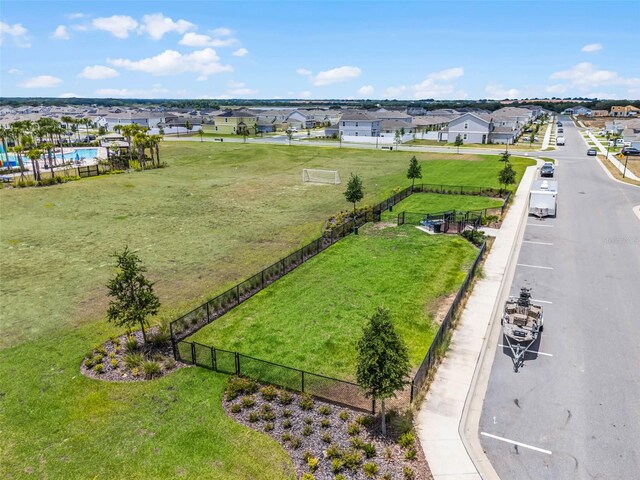 1880 Perch Hammock Loop, Groveland, FL 34736 - aerial view of residential area featuring a pool