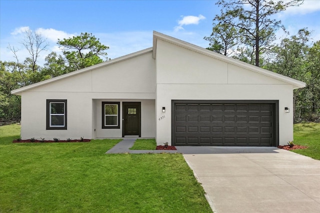 view of front facade featuring an attached garage, concrete driveway, stucco siding, and a front lawn