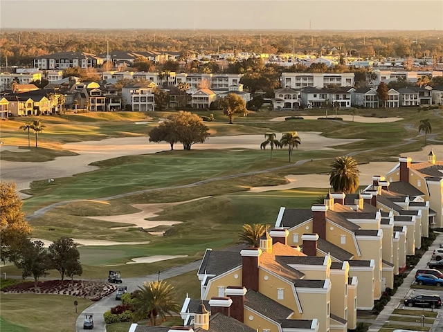 aerial view featuring a residential view and view of golf course