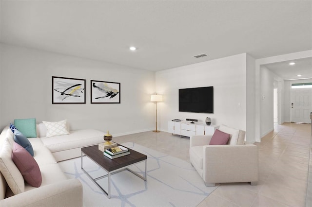 living room featuring visible vents, recessed lighting, baseboards, and light tile patterned floors