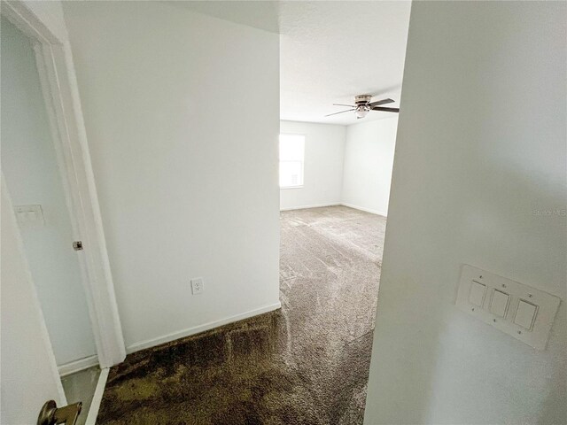 547 Jett Ln, Davenport, FL 33837 - empty room featuring carpet and ceiling fan