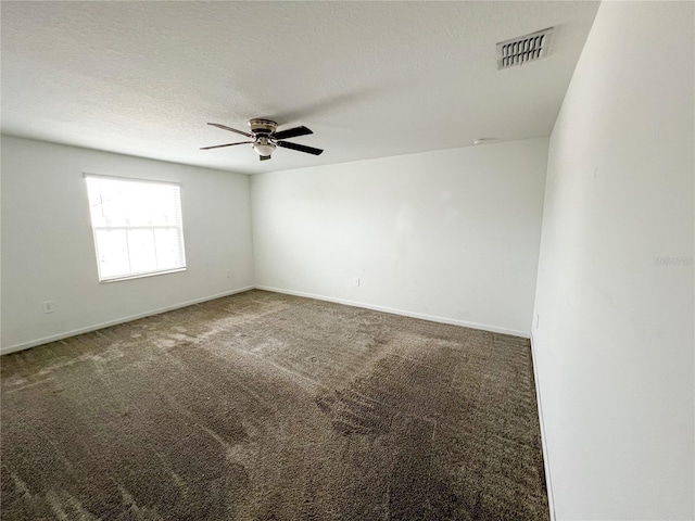 547 Jett Ln, Davenport, FL 33837 - carpeted empty room with ceiling fan and baseboards