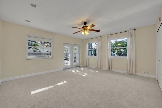 1231 Glastonberry Rd, Maitland, FL 32751 - carpeted spare room with plenty of natural light, baseboards, and ceiling fan
