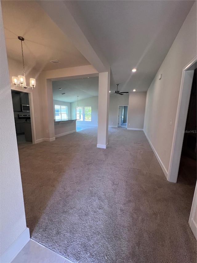 4264 Sagefield Dr, Saint Cloud, FL 34773 - empty room featuring baseboards, carpet flooring, and ceiling fan with notable chandelier