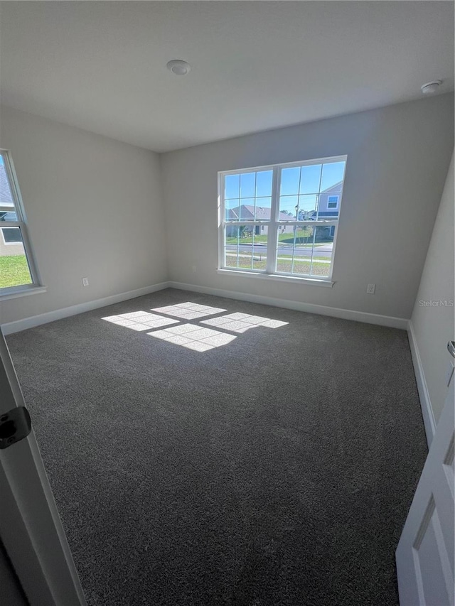 4264 Sagefield Dr, Saint Cloud, FL 34773 - unfurnished room with carpet floors and baseboards