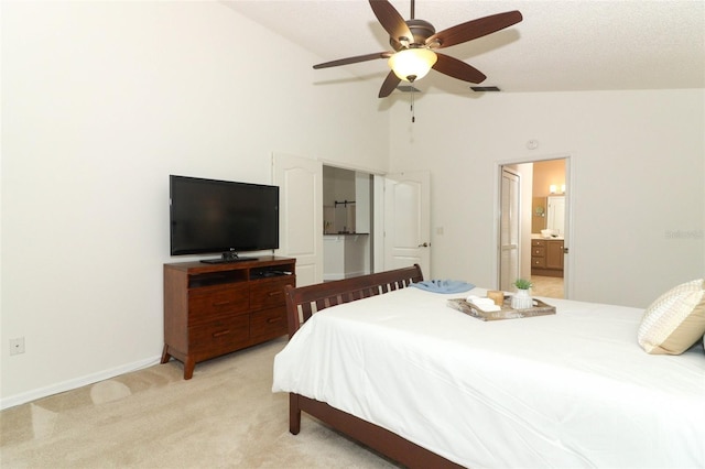 bedroom featuring connected bathroom, ceiling fan, light carpet, visible vents, and vaulted ceiling