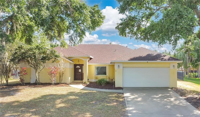 1512 Adriatic Dr, Ocoee, FL 34761 - ranch-style house featuring an attached garage, a shingled roof, stucco siding, and driveway
