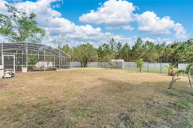 1512 Adriatic Dr, Ocoee, FL 34761 - view of yard with a fenced backyard and a lanai