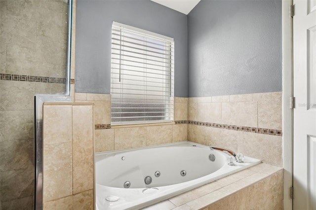 full bath featuring a whirlpool tub