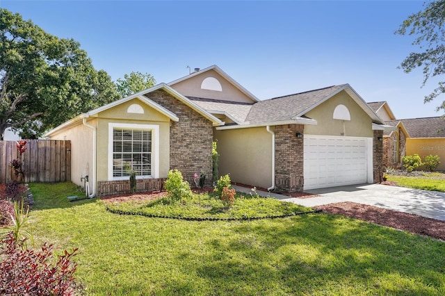 ranch-style house with a front yard, a garage, fence, concrete driveway, and stucco siding