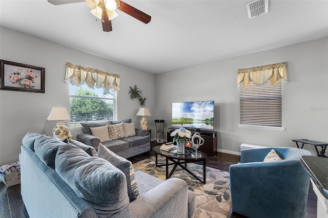 3917 Pemberly Pines Cir, Saint Cloud, FL 34769 - living area with visible vents, baseboards, ceiling fan, and wood finished floors