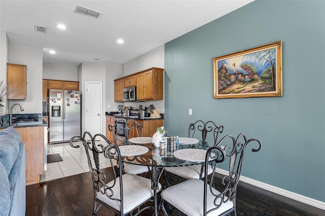 3917 Pemberly Pines Cir, Saint Cloud, FL 34769 - dining room featuring visible vents, recessed lighting, baseboards, and light wood-style floors