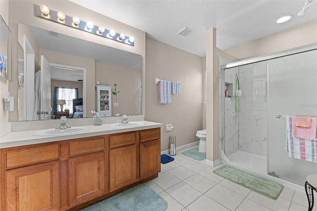 3917 Pemberly Pines Cir, Saint Cloud, FL 34769 - ensuite bathroom featuring visible vents, a sink, connected bathroom, and a marble finish shower