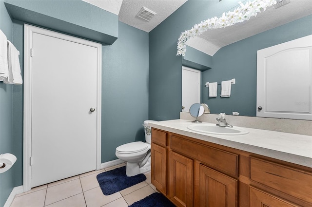 3917 Pemberly Pines Cir, Saint Cloud, FL 34769 - bathroom featuring visible vents, vanity, toilet, baseboards, and tile patterned floors