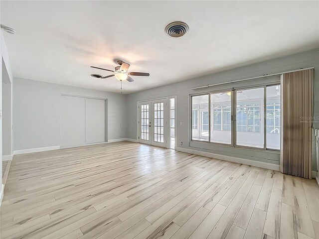 2631 Mcdonald Ter, Mount Dora, FL 32757 - unfurnished room featuring baseboards, ceiling fan, light wood finished floors, and visible vents