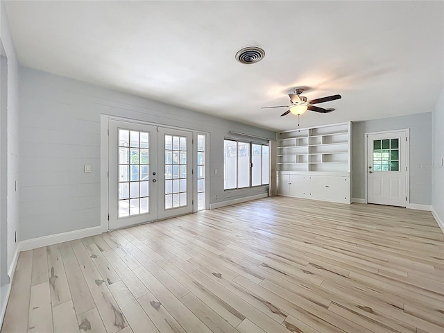 2631 Mcdonald Ter, Mount Dora, FL 32757 - interior space with french doors, a ceiling fan, baseboards, a healthy amount of sunlight, and visible vents