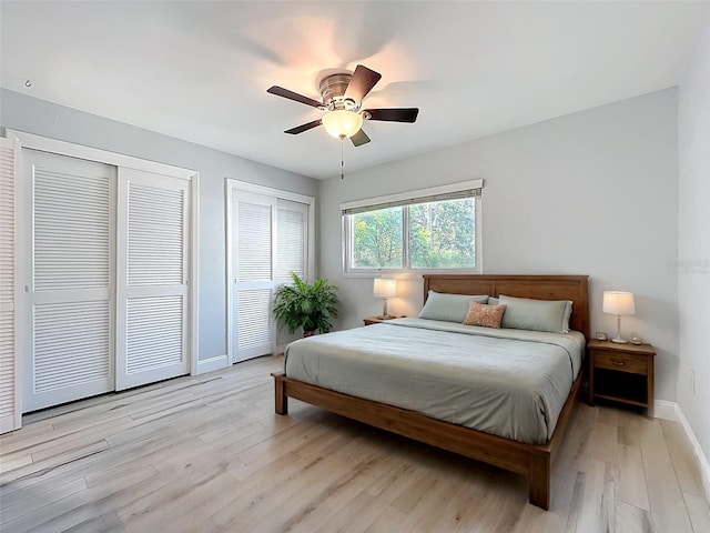 2631 Mcdonald Ter, Mount Dora, FL 32757 - bedroom with a ceiling fan, baseboards, multiple closets, and light wood finished floors