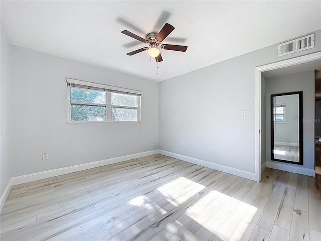 2631 Mcdonald Ter, Mount Dora, FL 32757 - empty room with baseboards, a ceiling fan, light wood finished floors, and visible vents